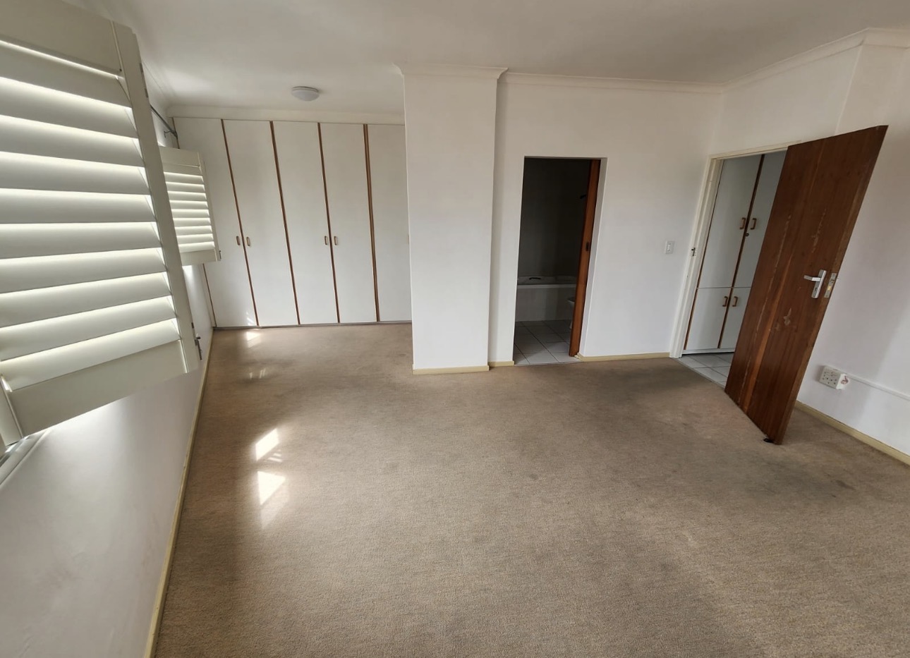 Room before floor tiling — old carpet